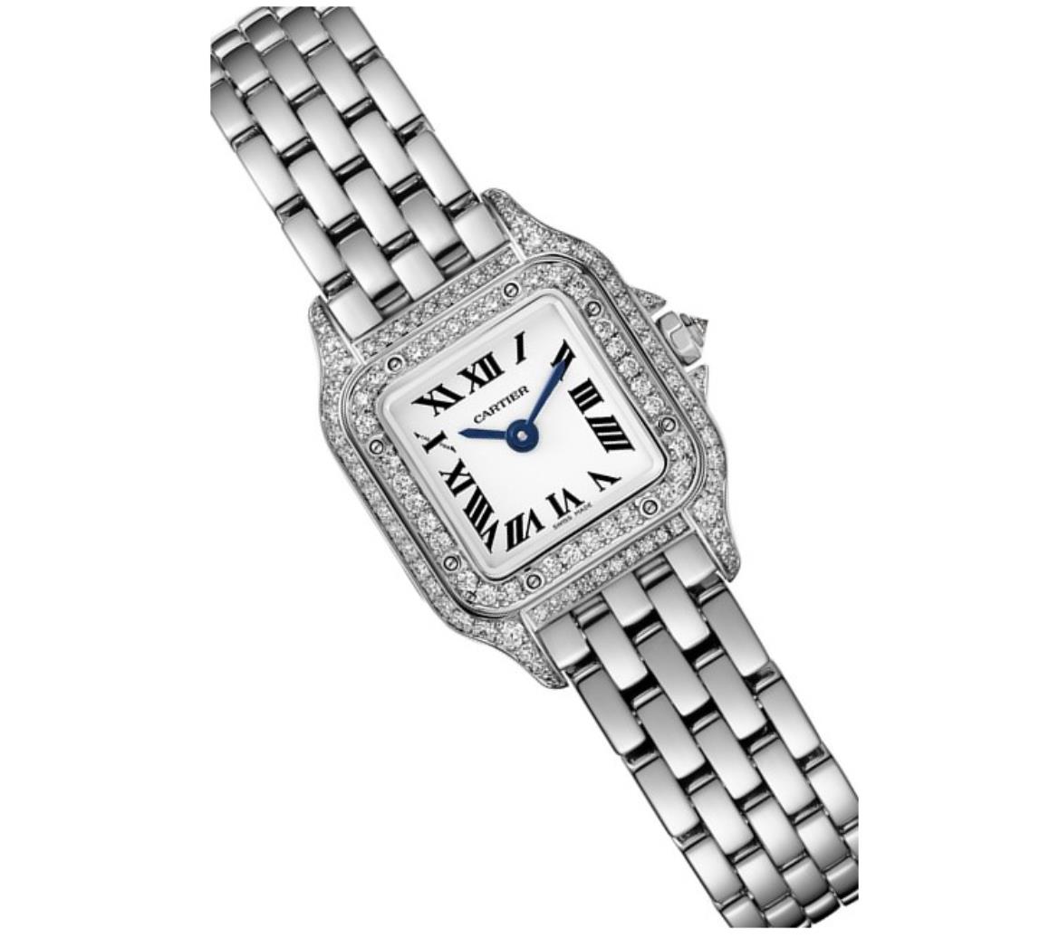 The white dial fake watch is decorated with diamonds.